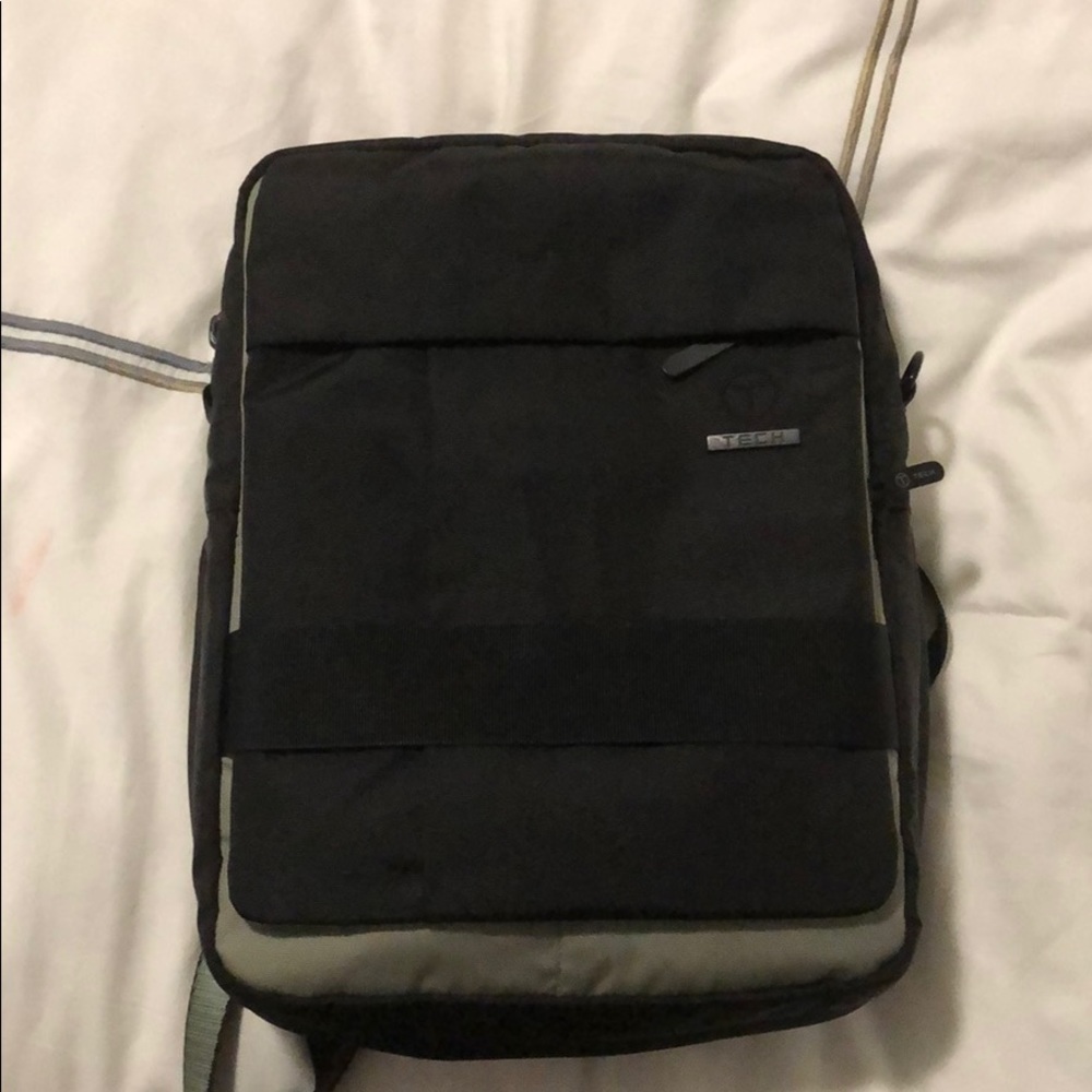 Tumi T Tech Back Pack converts to briefcase.